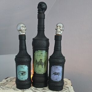 Three Black Glass Gothic Witch Tincture Potion Bottles With Skull Cork Stoppers
